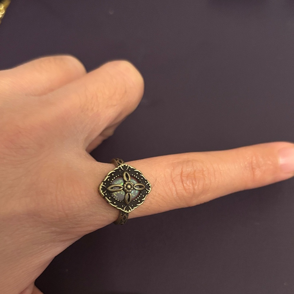Elegant Gold-Toned Ring with Intricate Design